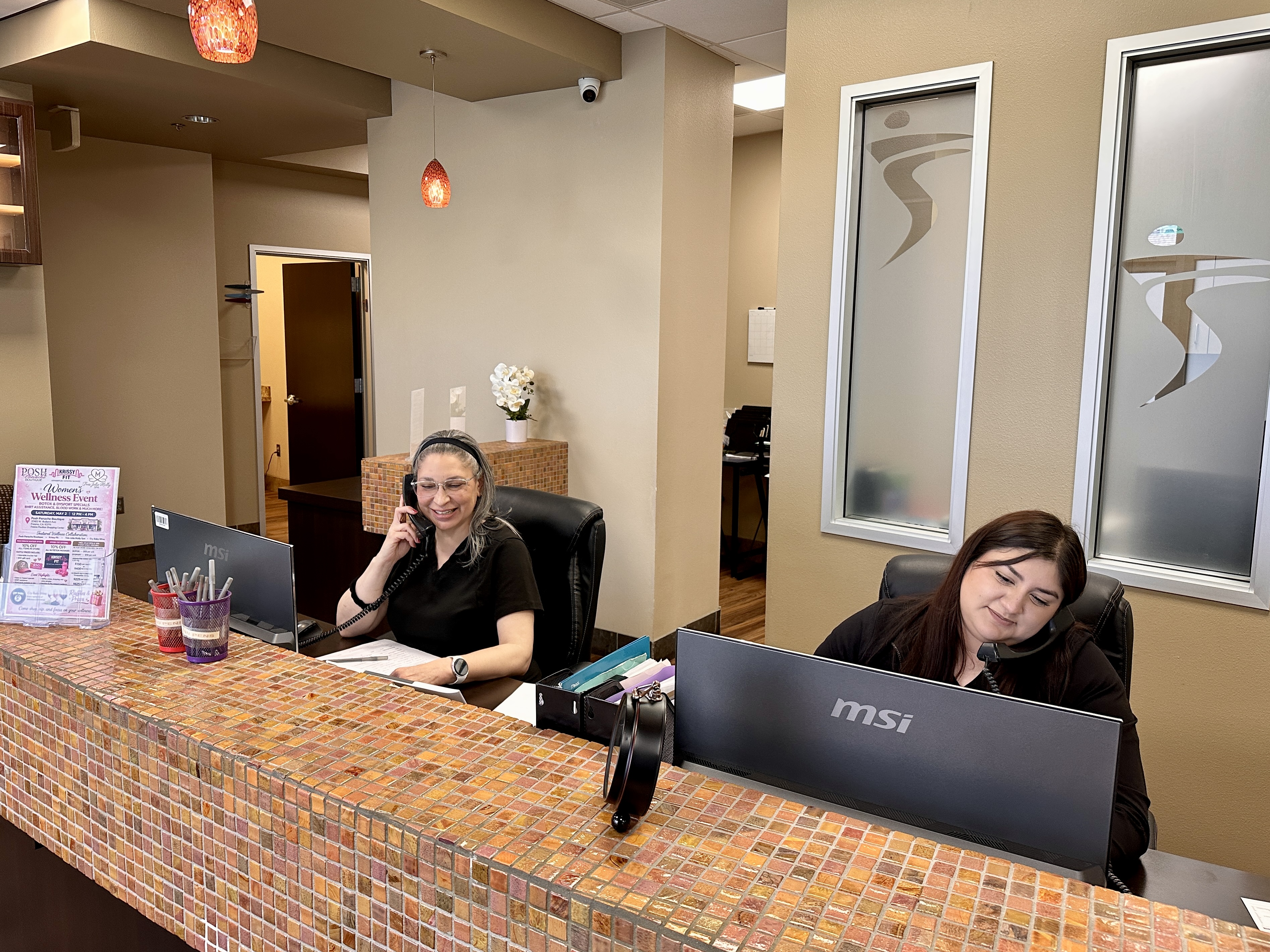 Prestige urgent care reception team ready to help